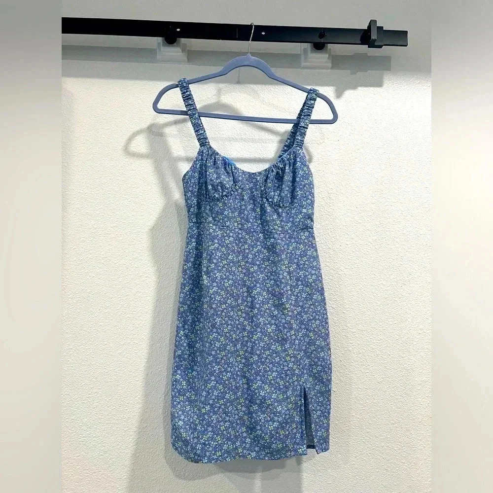 Mini sundress. Blue floral print with cute front side slit
